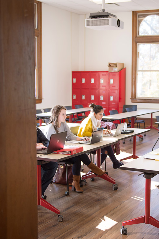 Two students in a classroom.