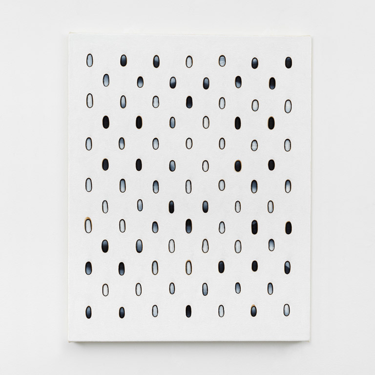 White artwork with blue dots.