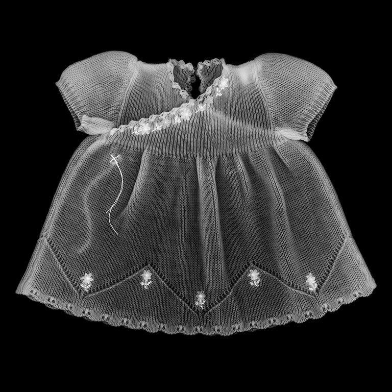 A white knit children's dress